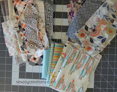 low volume prints liberated churn dash quilt