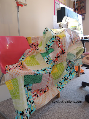 Sewing rows of Dropping In quilt together Dropping In quilt Good Vibes fabric PFAFF performance icon