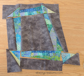 batik jelly roll fabrics liberated churn dash block batik jelly roll fabric liberated churn dash block