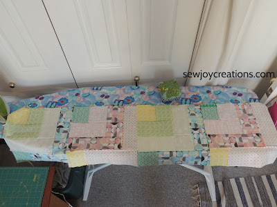 pinning quilt rows Good Vibes fabric Dropping In quilt