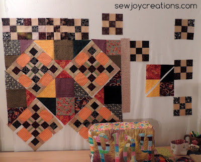 pumpkin blocks with setting triangles as quilt top