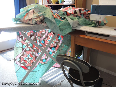 On Ringo Lake quilt adding borders ironing board support